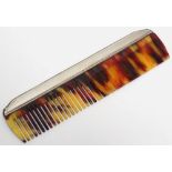 A silver mounted tortoishell comb CONDITION: Please Note - we do not make reference