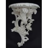 Floral white painted wall bracket CONDITION: Please Note - we do not make