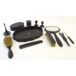An ebony with white metal dressing table set comprising twelve pieces (12) CONDITION: