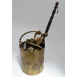 A brass coal scuttle, together with a quantity of brass, copper and pewter accessories.