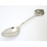 A silver teaspoon with crossed rifle decoration to handle hallmarked Birmingham 1926 maker William