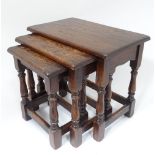 A nest of three oak occasional tables CONDITION: Please Note - we do not make
