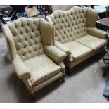 A 2 seater wing back sofa,