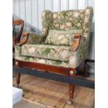 An upholstered armchair CONDITION: Please Note - we do not make reference to the