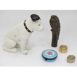 Assorted items to include a parrot cane top, a money box, pill boxes etc.