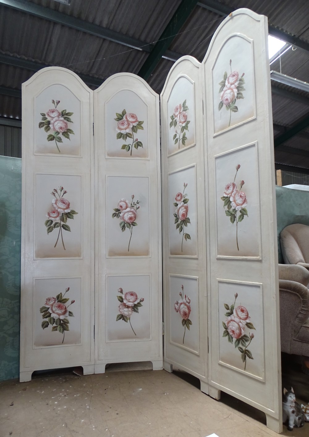 A 4 fold screen with painted rose decoration CONDITION: Please Note - we do not