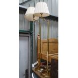 A pair of brass reading lamps CONDITION: Please Note - we do not make reference to