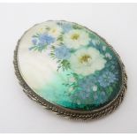 A hand painted carved shell brooch CONDITION: Please Note - we do not make