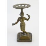 A 19thC cast brass oil lamp stand depicting a female figure.