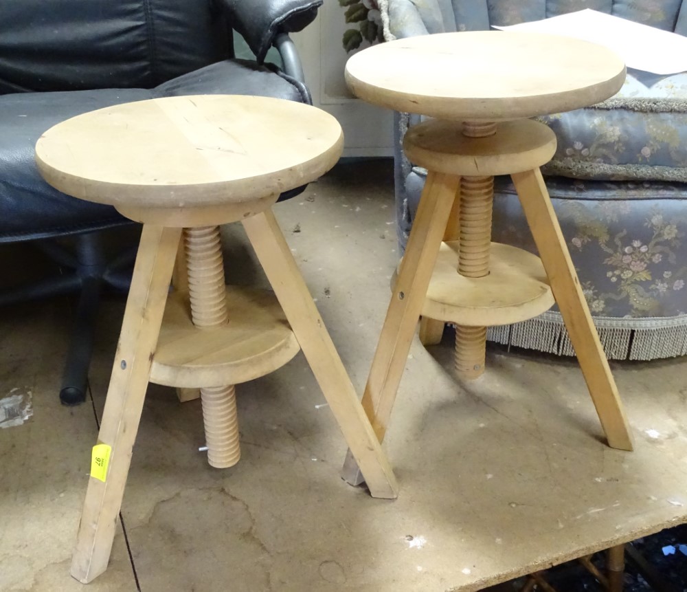 A pair of adjustable wooden stools CONDITION: Please Note - we do not make