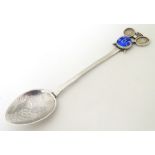 Badminton Interest: A silver teaspoon with crossed badminton racquets and shuttlecock to handle