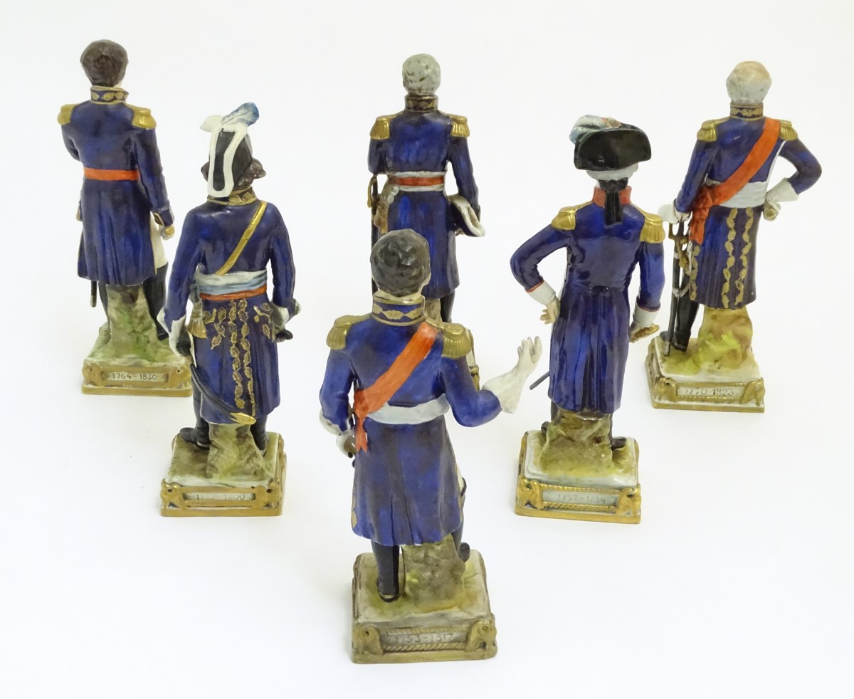 A group of six French ceramic Napoleonic military figures with various attributes and poses, - Bild 4 aus 8