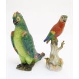 A Meissen parrot perched upon a branch base,