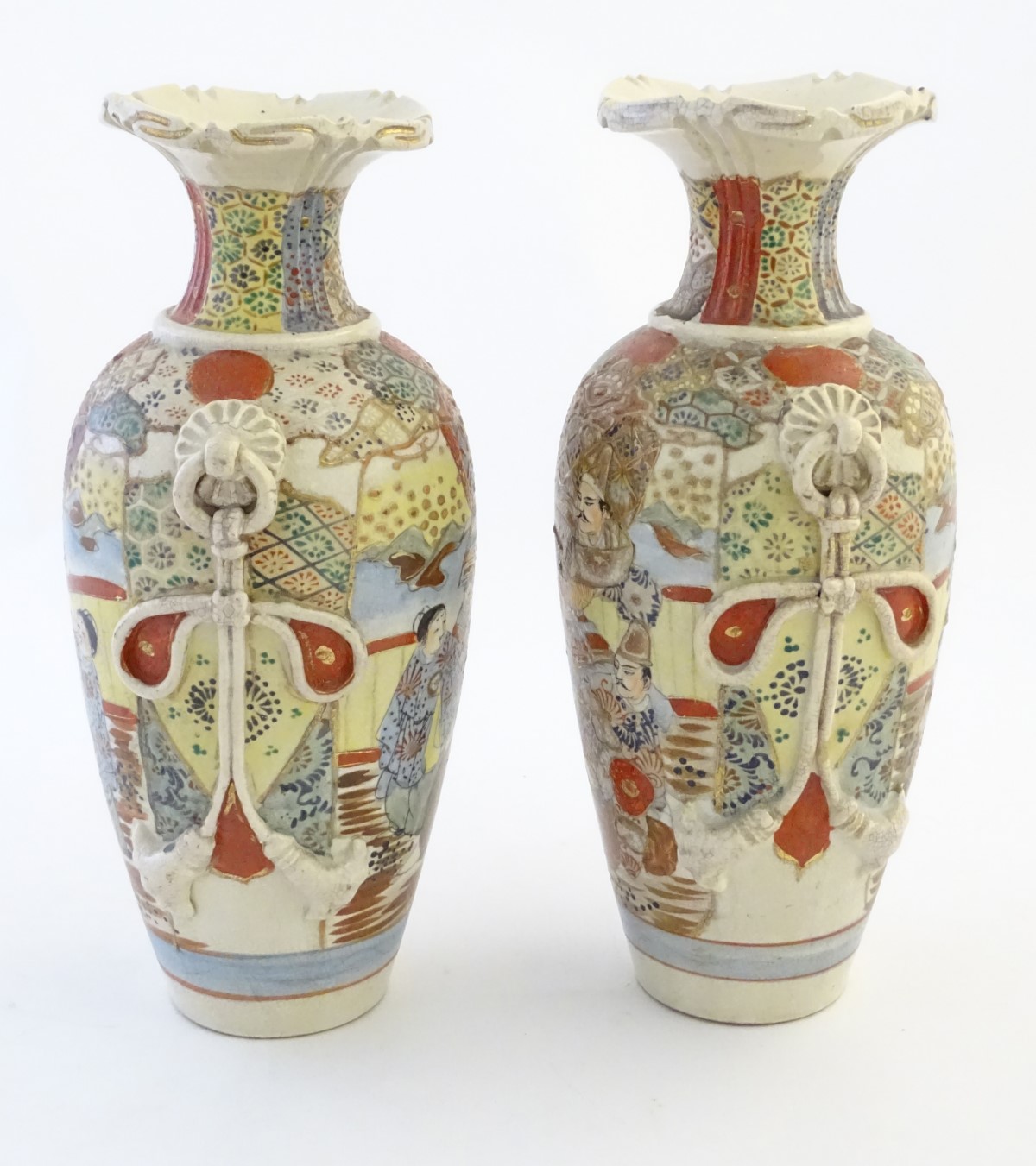 A pair of Japanese Satsuma vases, decorated with figures in a lavish interior, - Image 6 of 7