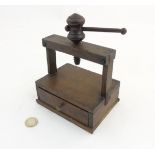 A late 19thC / early 20thC oak miniature book press / printing press with drawer under.