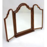 An early / mid 20thC walnut dressing table mirror,