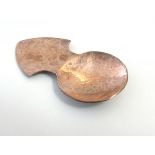 Arts and Crafts : A copper plannished / hammered caddy spoon with circular bowl.