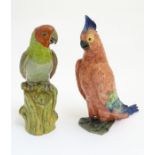 Two ceramic models of exotic birds. One indistinctly marked under. Largest approx. 15” high.