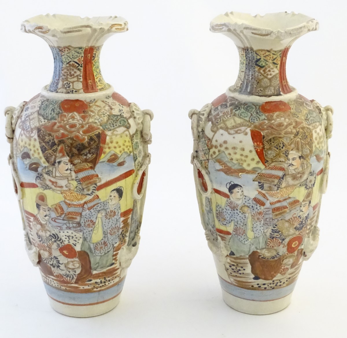 A pair of Japanese Satsuma vases, decorated with figures in a lavish interior, - Image 5 of 7