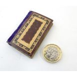 Sewing / needlework : A 19thC Tunbridgeware stick ware inlaid needle case with velvet spine 2 1/4"