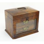 A late 19thC walnut jewellery box with beveled glass front an silk lined interior.