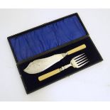 A cased set of silver plate and ivorine fish servers,