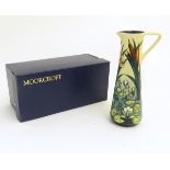 A Moorcroft ewer/jug of tall,