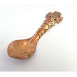 Arts and Crafts : A shaped plannished / hammered copper spoon with scraffito and pierced decoration