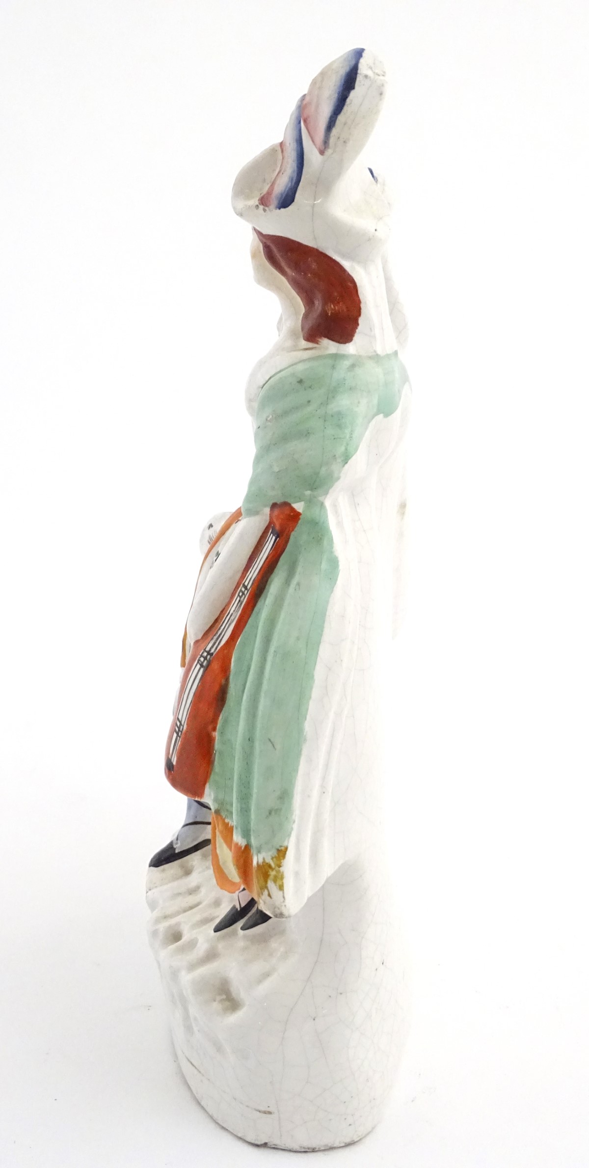 A Staffordshire pottery figural group of two figures with instruments in formal wear and plumed - Image 6 of 6