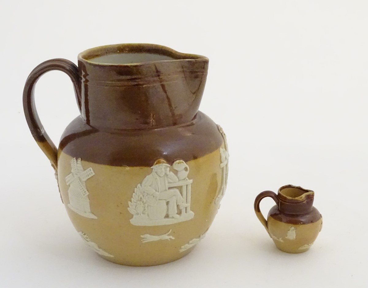 Two Royal Doulton two-tone salt glazed jugs.