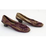 A pair of ladies silk shoes c1860, with rosette detail to front,