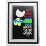 Rock and Pop Musical Memorabilia: A framed Woodstock festival 1969 advertising poster reprint by