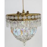 Drop bag light fitting: a circular iridescent 2 tier pendant light fitting, 12 1/2” in diameter.