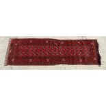 Carpet / Rug : A hand made woollen runner having 2 x 16 (32) geometric decoration to middle with