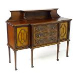 An early 20thC mahogany sideboard,