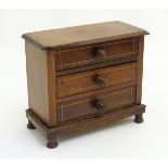 Apprentice Piece: a miniature inlaid mahogany 3 drawer chest of drawers,