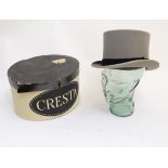 A grey felt top hat in size 7, marked 'Woodrow Piccadilly London',