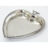 A silver pin dish / gaming counter dish of heart shape hallmarked Birmingham 1911 maker Edward &