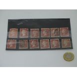 Stamps: A book of ten Victorian Penny Red stamps CONDITION: Please Note - we do