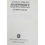 A Stanley Gibbons stamp album, Guernsey, including Alderney, approx. 120 leaves.