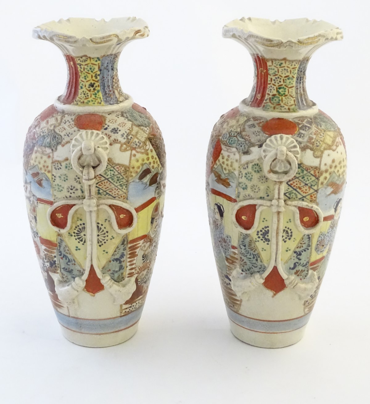 A pair of Japanese Satsuma vases, decorated with figures in a lavish interior, - Image 4 of 7