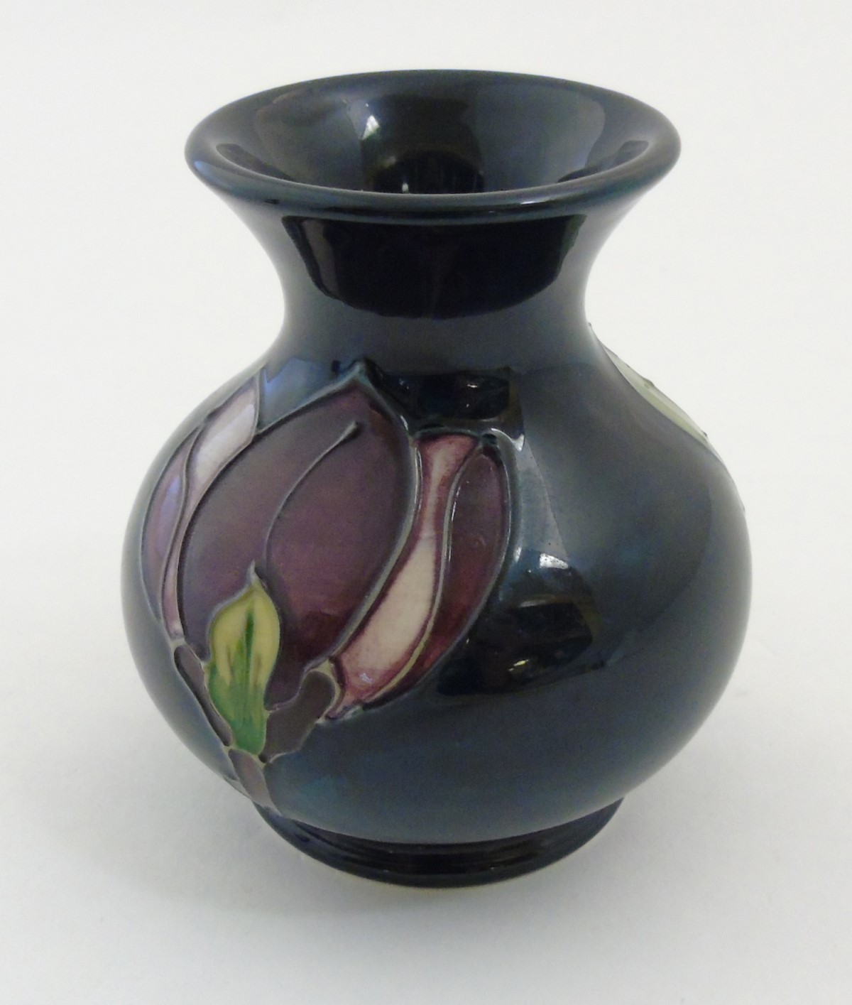 A 1994 Moorcroft Magnolia vase on dark blue ground, makers mark to base, - Image 6 of 6