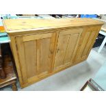 A late 19thC / early 20thC pine sideboard / kitchen low cupboard