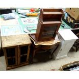 An assortment of furniture comprising a console table, a glazed cabinet,