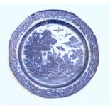 A 19thC blue and white pearlware plate with a chinoiserie scene depicting a figure with a parasol