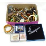 A box of costume jewellery CONDITION: Please Note - we do not make reference to