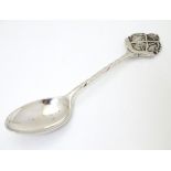 A silver teaspoon with crossed rifle decoration to handle hallmarked Birmingham 1926 maker William