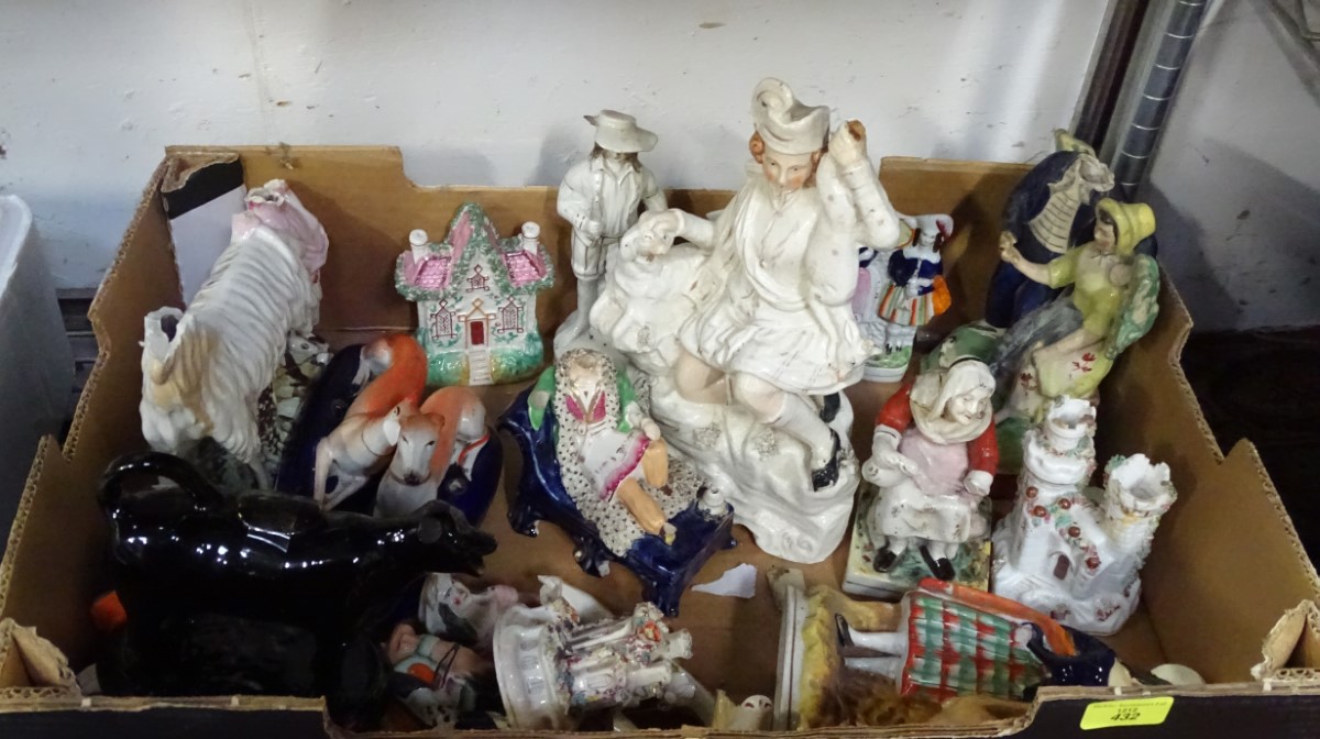 A quantity of Staffordshire pottery figures CONDITION: Please Note - we do not make