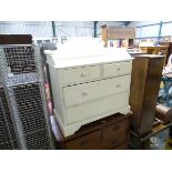 A white painted child's chest of drawers CONDITION: Please Note - we do not make
