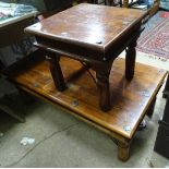 An Indian hardwood and iron coffee table,